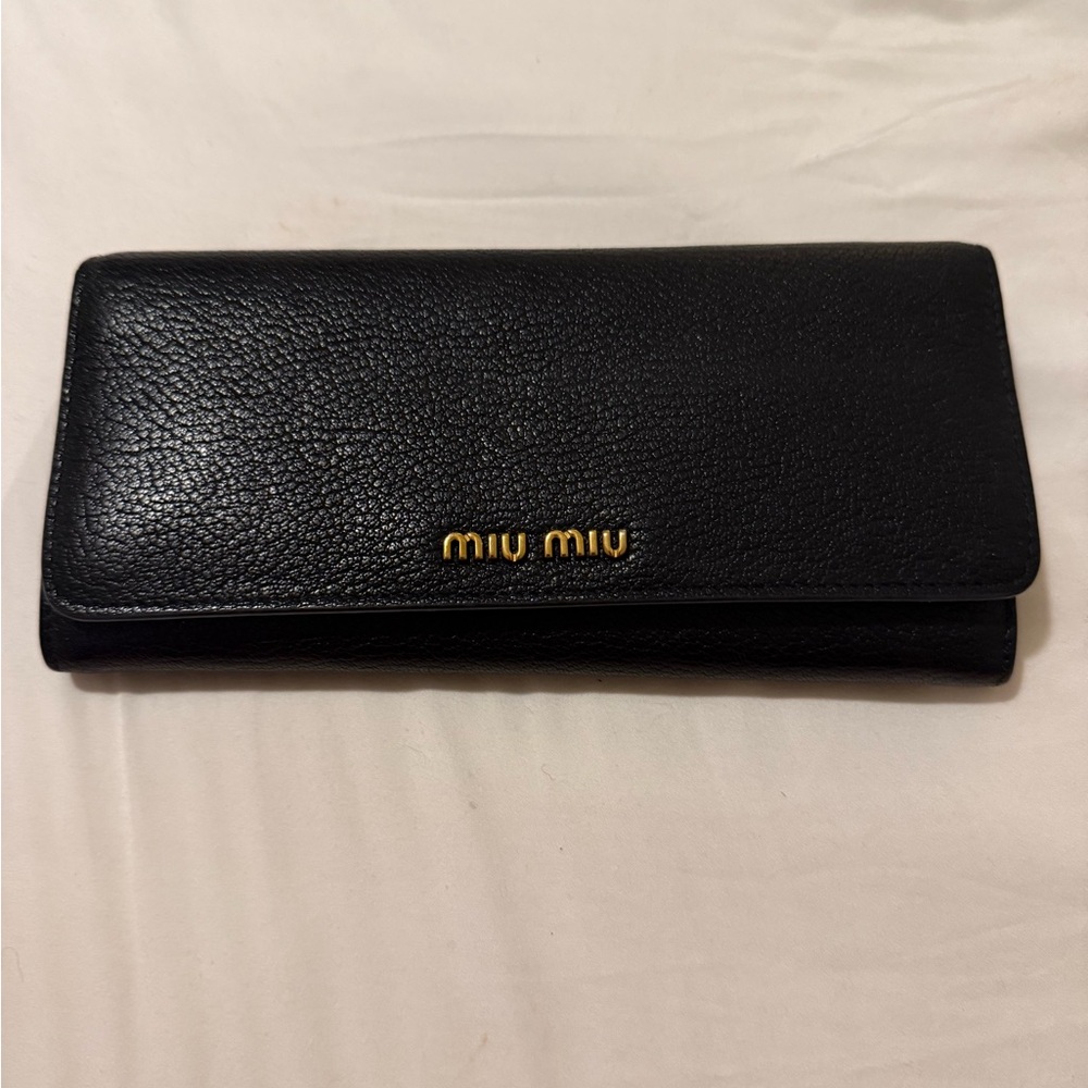 Miu Miu Black Leather 19 card wallet. Authenticity card included. No marks